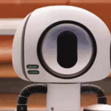 a close up of a little white robot with a large eye/camera who is shaking randomly and is covered with blue electrical sparks